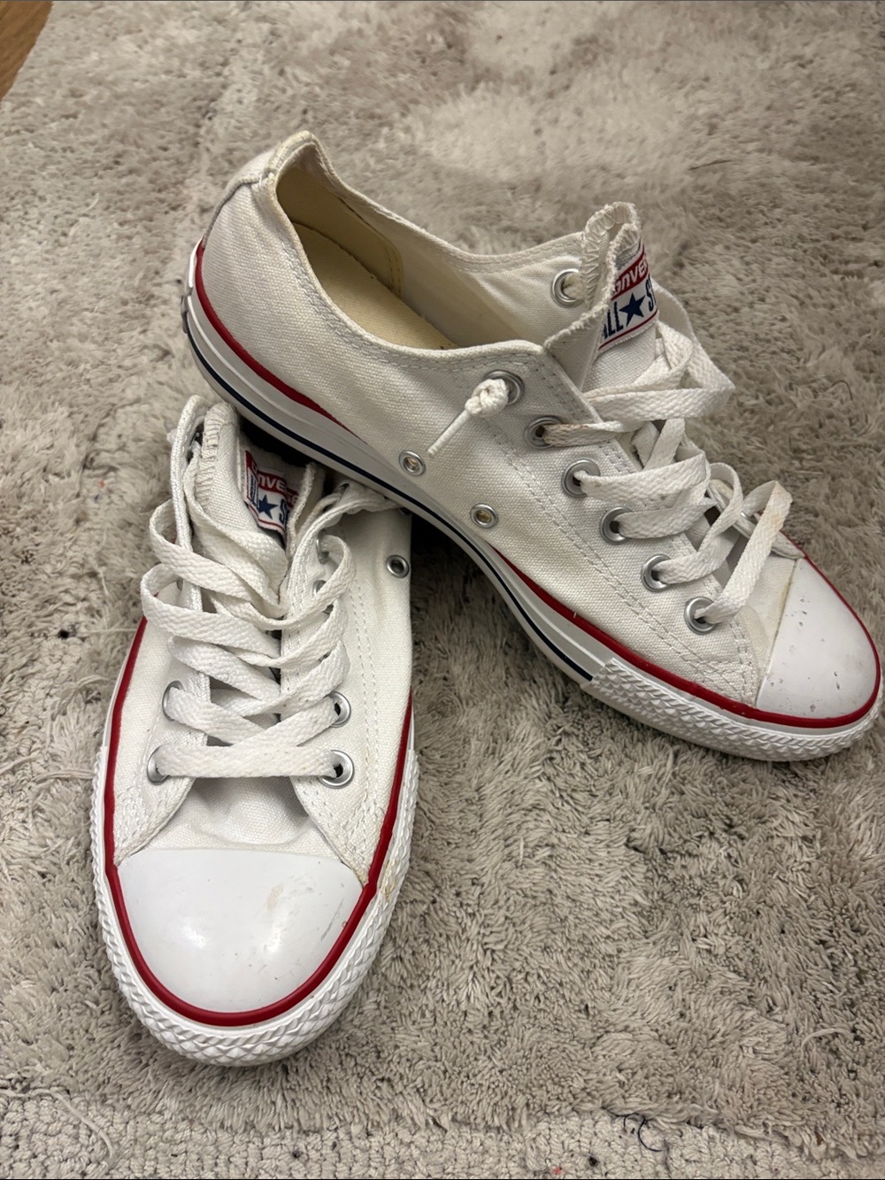 Converse Low Top Canvas Sneakers in White with Red Trim